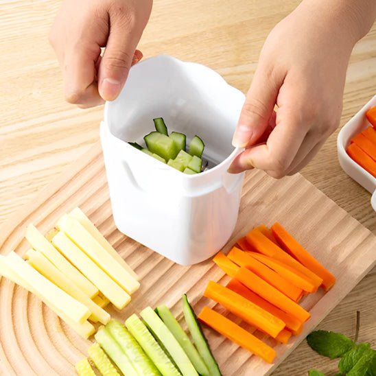 coupe frites avec différents légumes en batônnet