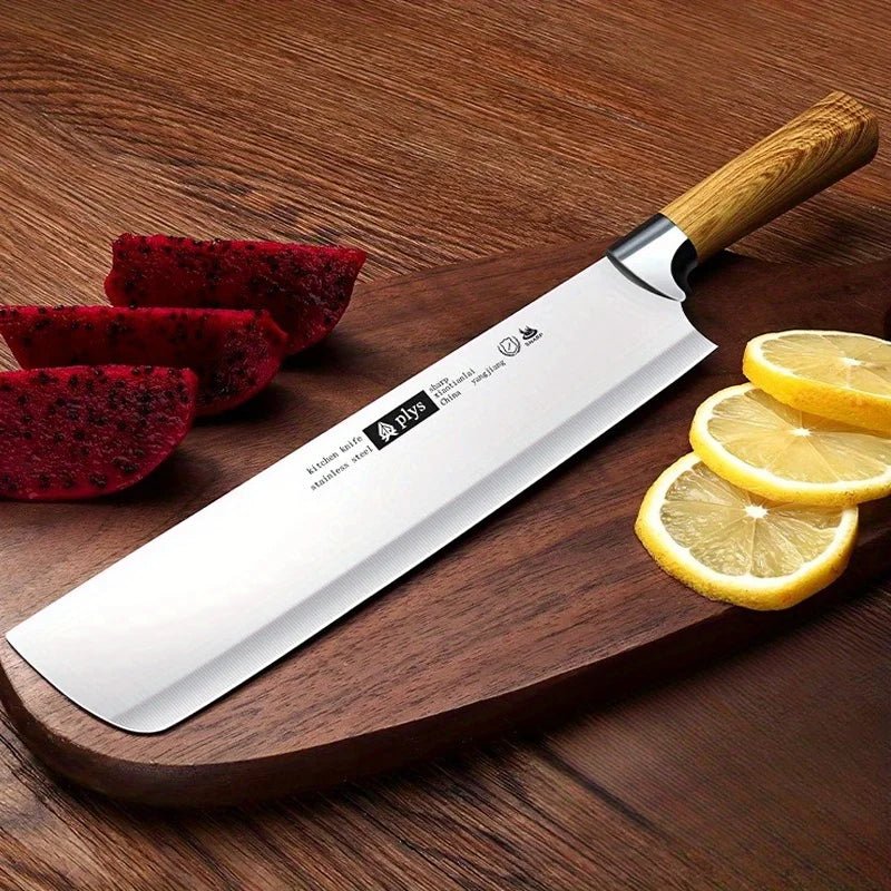 couteau de cuisine sur une planche à découper avec des fruits