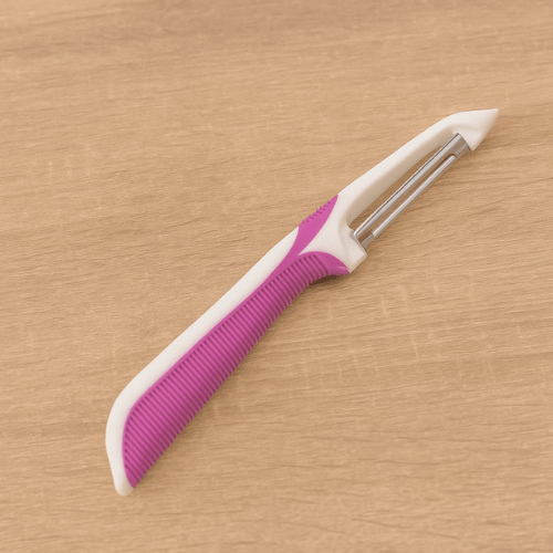 eplucheur couleur rose et blanc