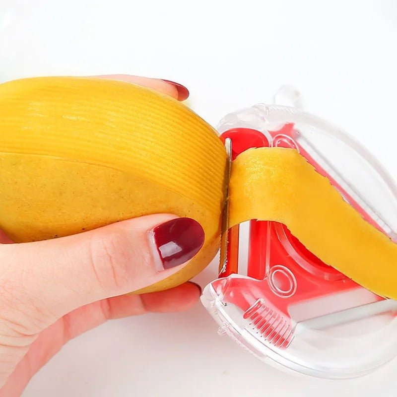 eplucheur épluchage d'une mangue