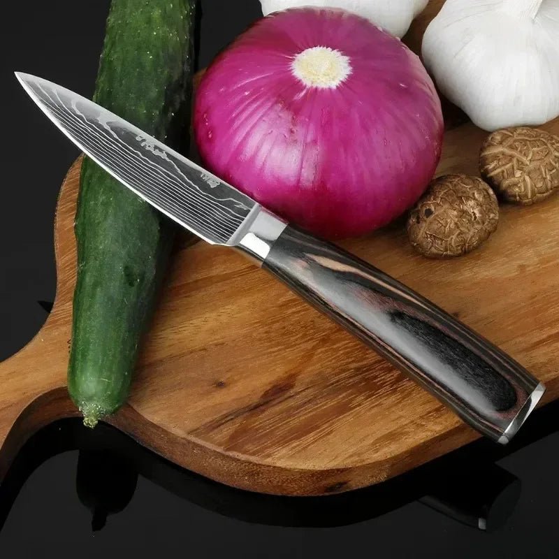 set de couteau de cuisine représenté avec des légues