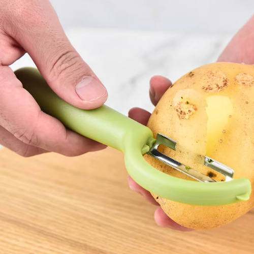 économe épluchage de pomme de terre