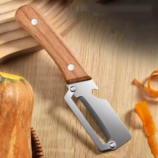 économe posé sur table avec une courge