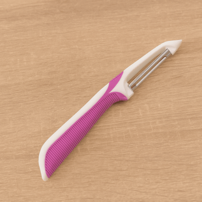 eplucheur couleur rose et blanc
