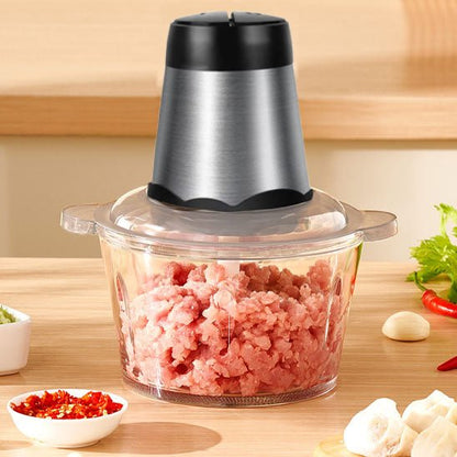 hachoir electrique avec de la viande dans le bol