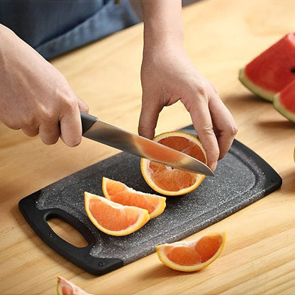 planche à découper découpe 'une orange
