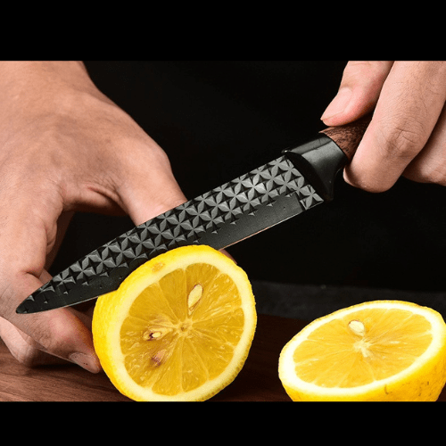 set de couteaux de cuisine coupe d'un citron